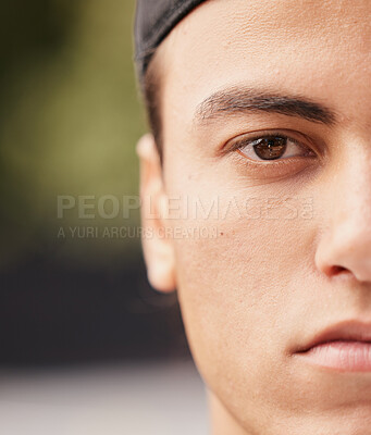 Buy stock photo Half, side and face of a man with focus, motivation and commitment for basketball in the city. Training, sports and facial portrait of an athlete serious about sport, fitness and mockup on court