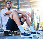 Cool black man, skateboard and freedom at urban skate park, city and relaxing summer for training, outdoor action and sports hobby in USA. Young skater guy, youth culture and hipster street lifestyle