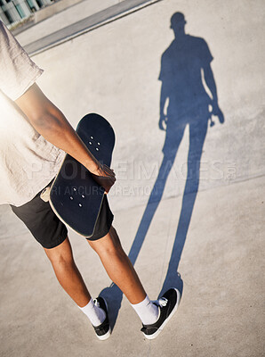Buy stock photo Skateboard, city and man shadow skate in park athlete ready for training, fitness and skate park exercise. Sports, workout and person from Los Angeles with board on concrete for skateboarding sport