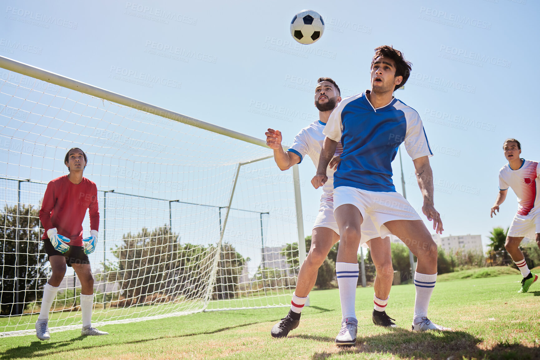 Buy stock photo Soccer, sports and team playing game on an outdoor field for exercise, training and workout. Teamwork, football and healthy athletes practicing with ball on a grass pitch for match, fitness and skill