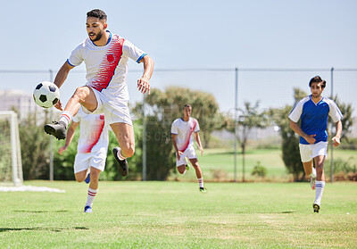 Buy stock photo Football, soccer players in match and competition game with professional adult footballers with temwork, passion and athletic skill. Outdoor grass, soccer field with team running to kick soccer ball 