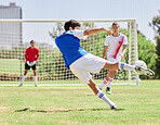 Sports, soccer and athlete scoring a goal during a match or training on an outdoor pitch at a stadium. Football, fitness and healthy man practicing to score at a game for exercise or workout on field
