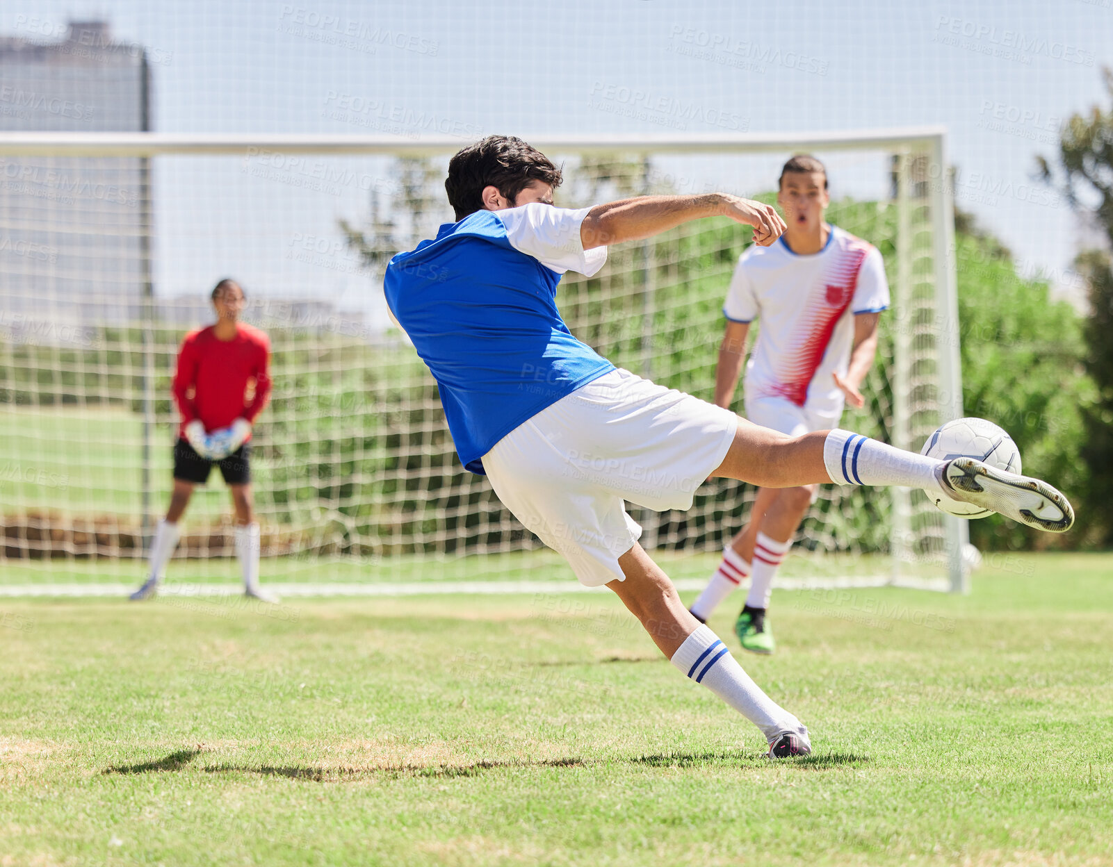 Buy stock photo Sports, soccer and athlete scoring a goal during a match or training on an outdoor pitch at a stadium. Football, fitness and healthy man practicing to score at a game for exercise or workout on field
