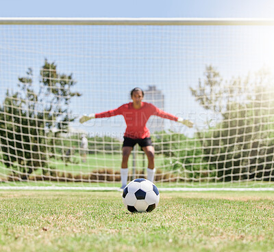 Buy stock photo Soccer, sports and goalkeeper in defence for game, exercise and training at football pitch to stop goal outdoor. Professional male athlete or goalie with soccer ball on field for sport hobby