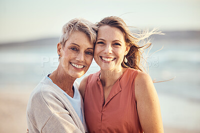 Buy stock photo Beach, hug and elderly mother and daughter relax, bond and enjoy quality time freedom, peace or travel vacation. Mama's love, nature wind and happy family portrait of women on Toronto Canada holiday