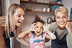Happy, mother and grandmother with child baker in playful joy or funny laughter with smile for bonding time at home. Mama, grandma and kid baking together for fun family girl activity in the kitchen