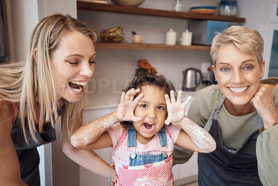 Buy stock photo Happy, mother and grandmother with child baker hands in playful joy or funny laughter with smile for bonding at home. Mama, grandma and kid baking together for fun family time activity in the kitchen