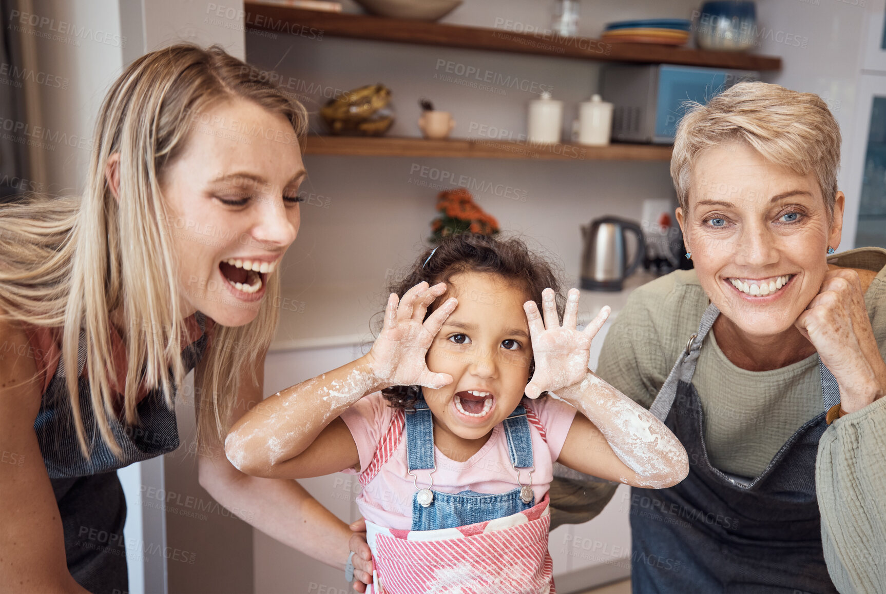 Buy stock photo Happy, mother and grandmother with child baker hands in playful joy or funny laughter with smile for bonding at home. Mama, grandma and kid baking together for fun family time activity in the kitchen