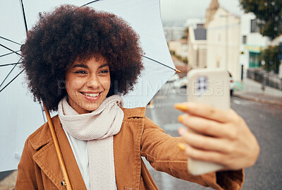 Buy stock photo Selfie, smile and woman with a phone and umbrella during winter in the street of Australia. Video call, 5g communication and girl with a mobile photo and live streaming in the street during rain