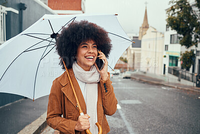 Buy stock photo Phone call communication, rain and girl with umbrella talking, discussion or speaking about London city weather. Mobile conversation, winter storm or happy black woman on 5g network call with contact