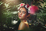 Flower, crown and woman in studio for makeup, beauty and skincare with plant, leaf and wellness. Portrait, skin and rose by girl model relax for creative, jungle and floral aesthetic, eco and product