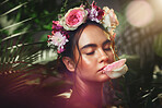 Beauty, skincare and flower with natural fragrance, flower and luxury wellness from nature with green forest background. Woman model with plant advertising cosmetic skin product with a flowers plant 