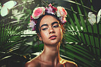 Beauty, nature and crown flower on woman in nature jungle for skincare, health and wellness with tropical dermatology product, cosmetics or makeup. Aesthetic spring model with natural floral mockup