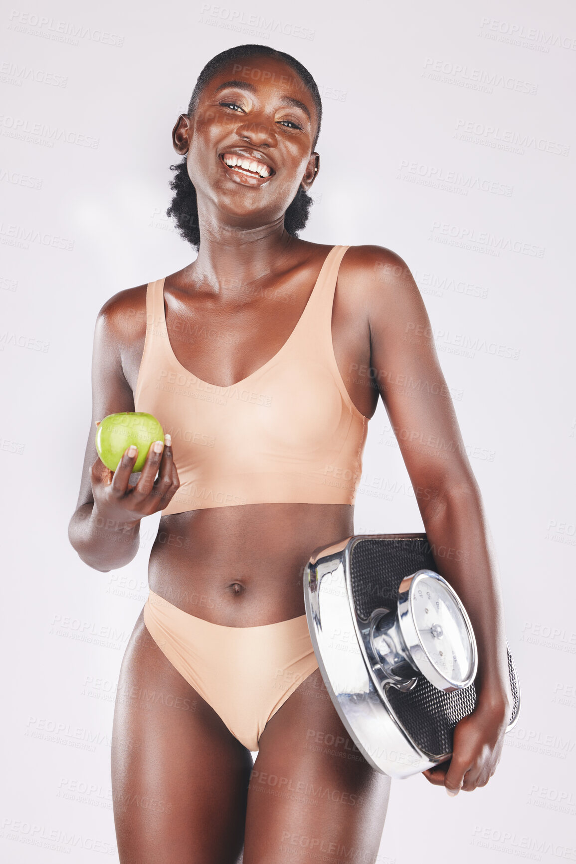 Buy stock photo Weight loss, health and wellness scale of a back woman fitness model with a smile. Portrait of a happy, smiling and healthy person from Africa feeling body confidence with apple diet food for eating