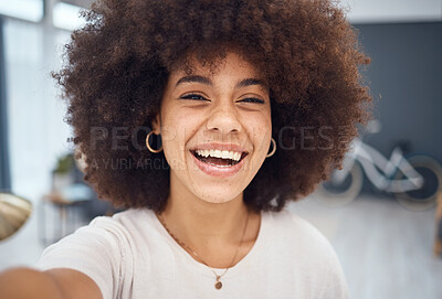 Buy stock photo Portrait selfie, black woman and video call in home for social media, online network or influencer vlog. Happy, smile or laughing young african girl with afro, curly hair and happiness relax in house