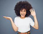 Portrait of happy black woman with mockup, studio background and advertising space for product placement. Afro, small business marketing with smile and model with hands out for text, brand or logo.