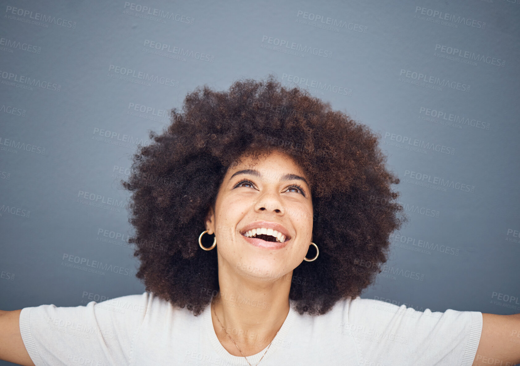 Buy stock photo Happy, hope and worship of black woman prayer for wellness, gratitude and faith with joyful smile. Happiness, peace and spiritual lifestyle of religious girl praying with gray studio mockup.


