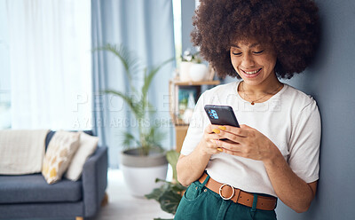 Buy stock photo Woman, funny social media phone and happy with online dating profile notification in living room. Young smile female with afro relax at home, smartphone connection and 5g mobile network technology
