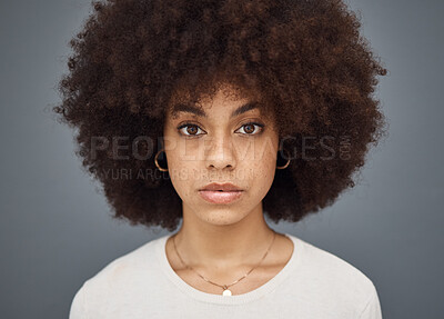 Buy stock photo Face, afro or Brazilian woman on grey studio background with makeup cosmetics, fashion hairstyle or healthy skin. Portrait, serious facial expression and beauty model with style, trendy or funky hair