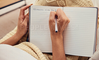 Buy stock photo Hands of woman relax, writing in notebook mockup for morning routine on living room sofa. Affirmations, personal goals and book of calm life thoughts or young girl creative thinking journal on couch 