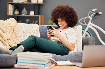Buy stock photo Social media, smile and student with phone on sofa after studying for university exam in a house. Communication, relax and girl with a smile and mobile on the couch while doing education for college