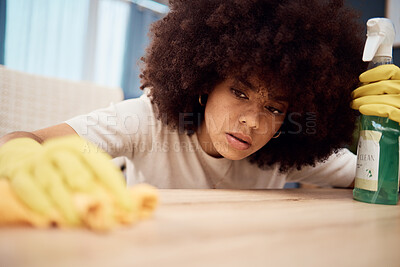 Buy stock photo Cleaning, table and black woman wipe dust from surface of furniture, desk and counter at home. Domestic hygiene, housework and girl using cleaning products, detergent and spray bottle to clean house