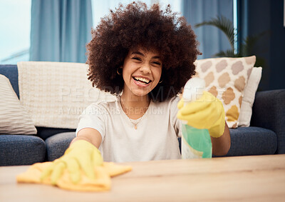 Buy stock photo Happy, portrait and black woman cleaning dust on a table furniture with a cloth, liquid soap in a spray bottle and gloves. Cleaner, cleaning services and African girl wipes a dirty or messy surface
