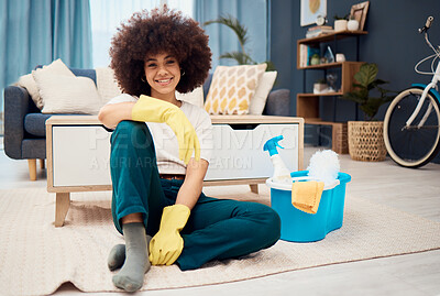 Buy stock photo Happy black woman, cleaning living room and relax taking break from housework, home hygiene routine and spring clean. Fresh household detergent, hygiene chemicals and domestic work with latex gloves