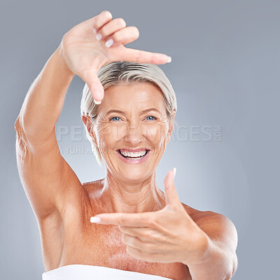 Buy stock photo Picture hand face frame, happy and senior woman with a smile from skin wellness and beauty. Portrait of a elderly person model feeling happiness from skincare and anti aging cosmetic treatment