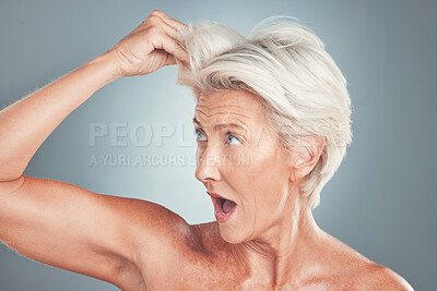 Buy stock photo Elderly woman with surprise, white hair in gray background studio and shocked face at healthy haircut. Short hairstyle in senior age, old lady with hair loss or dermatology skincare aesthetic