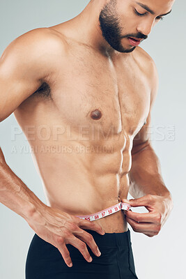 Black man, fitness and body, weightloss and measuring tape with abs, health  and active on blue bac Stock Photo by YuriArcursPeopleimages