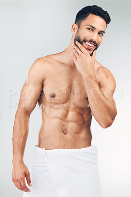 Buy stock photo Hygiene, shower and man with smile for body, beard and facial hair against a grey studio background. Wellness, cleaning and model happy washing for health, care for skin and grooming for beauty