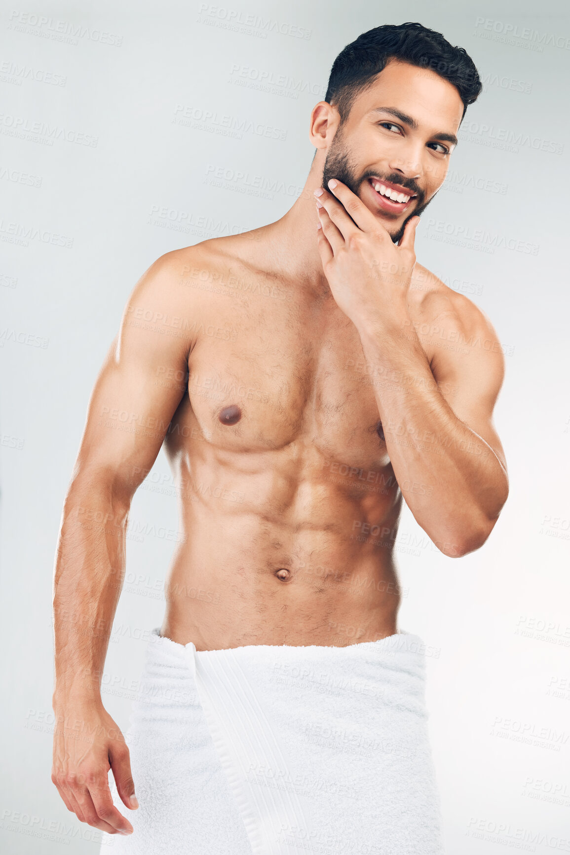 Buy stock photo Hygiene, shower and man with smile for body, beard and facial hair against a grey studio background. Wellness, cleaning and model happy washing for health, care for skin and grooming for beauty