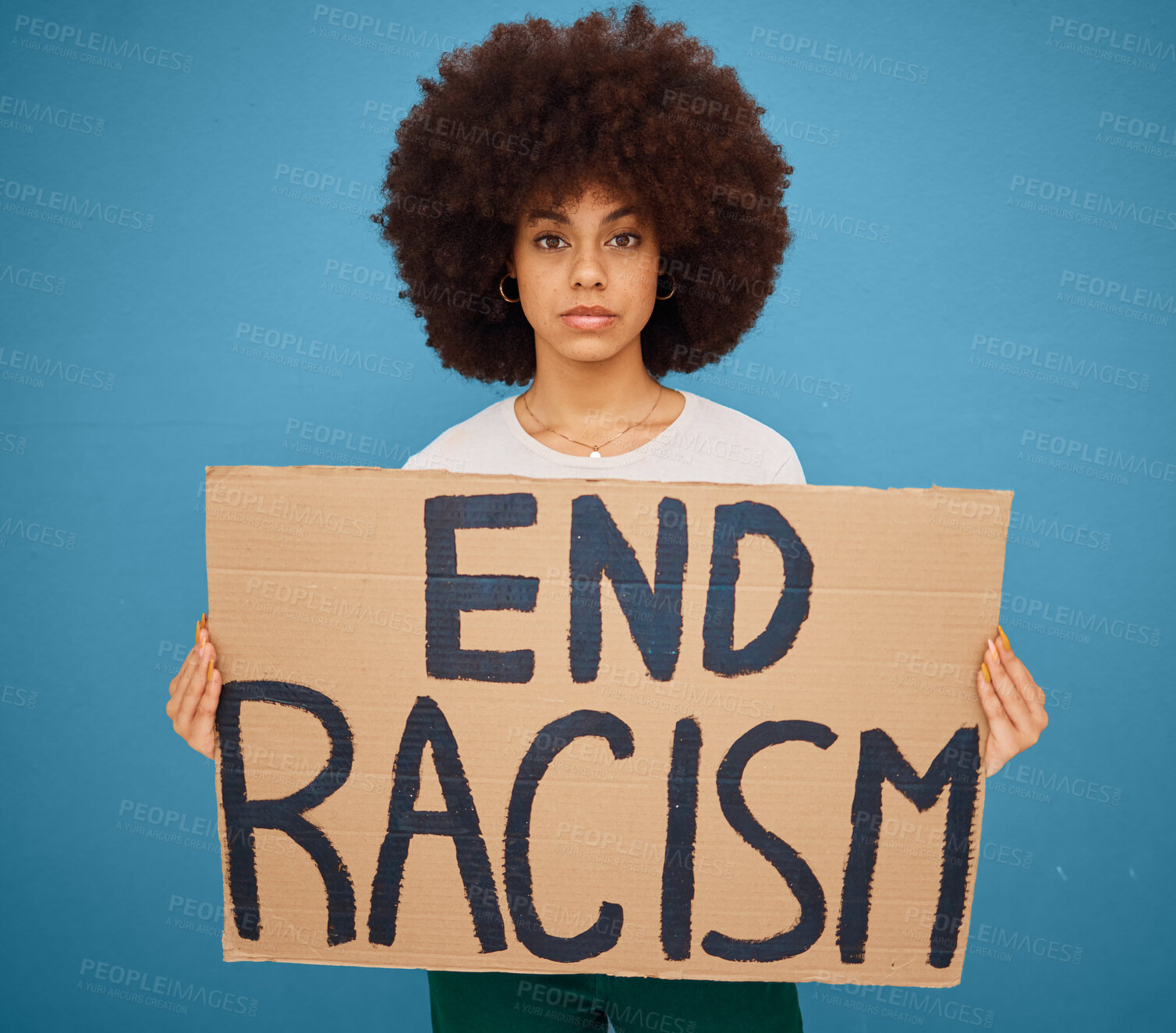 Buy stock photo Portrait of a black woman with a stop racism banner and peacefully protesting for human rights in studio. Young afro girl with a cardboard poster fighting for race, social justice or racial equality