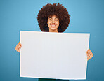 Advertising, mockup and woman with a poster for marketing, creative business and branding against a blue studio background. Logo, communication and portrait of a girl with a paper for news with space