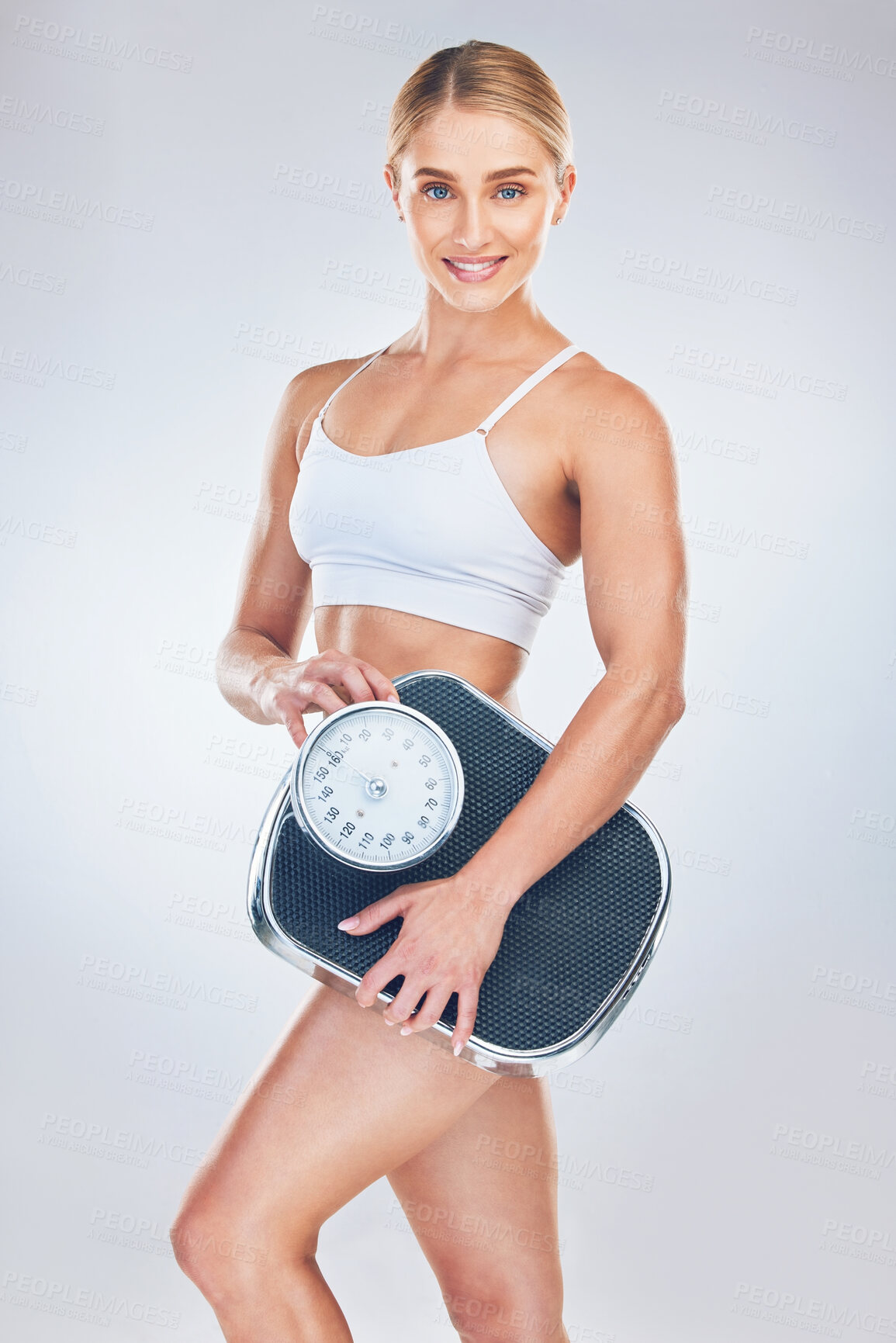 Buy stock photo Portrait, young woman and scale for weight loss, wellness and fitness with studio background. Health nutrition, healthy female or trainer happy, for results after weighing and body care for wellness