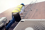 Solar energy, construction and worker on ladder for building, solar power and maintenance of renewable energy. Industrial employee climbing on a warehouse or house as handyman or construction worker
