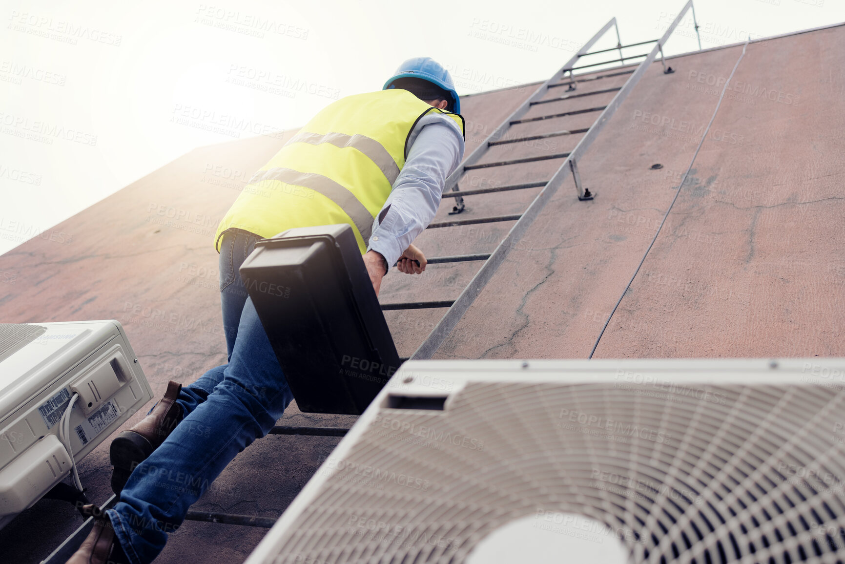 Buy stock photo Solar energy, construction and worker on ladder for building, solar power and maintenance of renewable energy. Industrial employee climbing on a warehouse or house as handyman or construction worker