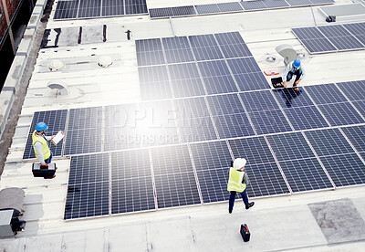 Buy stock photo Solar energy, construction and employees building solar panels in collaboration for sustainability, maintenance and engineering. Teamwork, manufacturing and roof construction working on clean energy