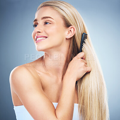 Buy stock photo Woman comb hairstyle, beauty and self care, grooming and cosmetics routine on studio background for smooth, shine and clean texture. Happy model brush blond hair care, scalp and head after shower 