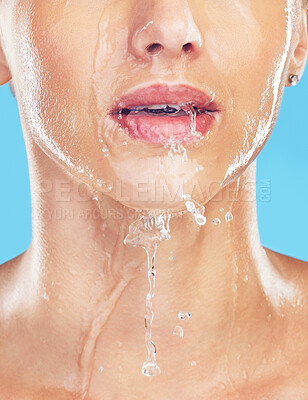 Buy stock photo Woman in shower, water splash on mouth and skincare beauty in morning with blue background. Healthy wellness in spa studio, cleaning face stream of aqua facial and washing natural body in bathroom