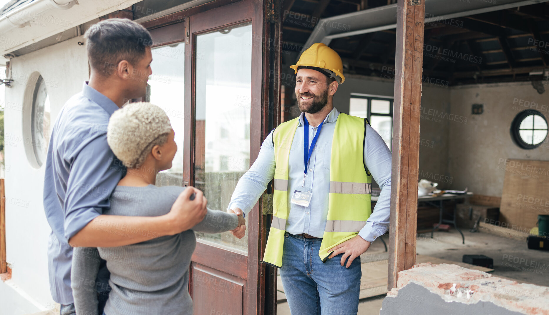 Buy stock photo Couple, home rennovation and construction builder shaking hands for congratulations on new house, real estate purchase and handyman. Industrial architect, property engineer and maintenance contractor