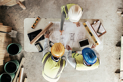 Buy stock photo Top view, construction workers or blueprint planning in house, home or office building in real estate, property or architecture innovation. Men, engineering woman or construction site people or ideas