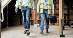 Walking, construction and teamwork with an engineer and designer working on a building site. Industry, developer and collaboration with a construction worker and engineering professional at work