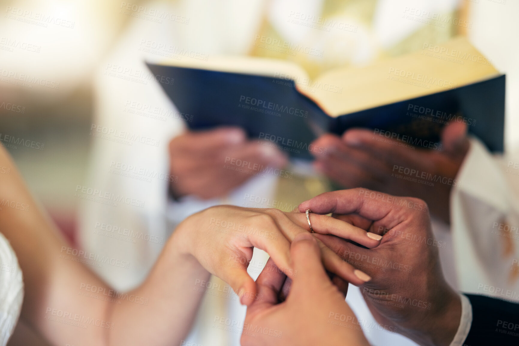 Buy stock photo Couple hands with ring, wedding and marriage in church with priest and bible in traditional ceremony. Commitment, love and jewelry, man and woman together with trust and jewellery with bride.