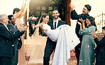 Wedding, love and man carrying woman outside church fo celebration of loving vows. Commitment and romance, romantic marriage, fun and man holding woman after love ceremony for bride and groom