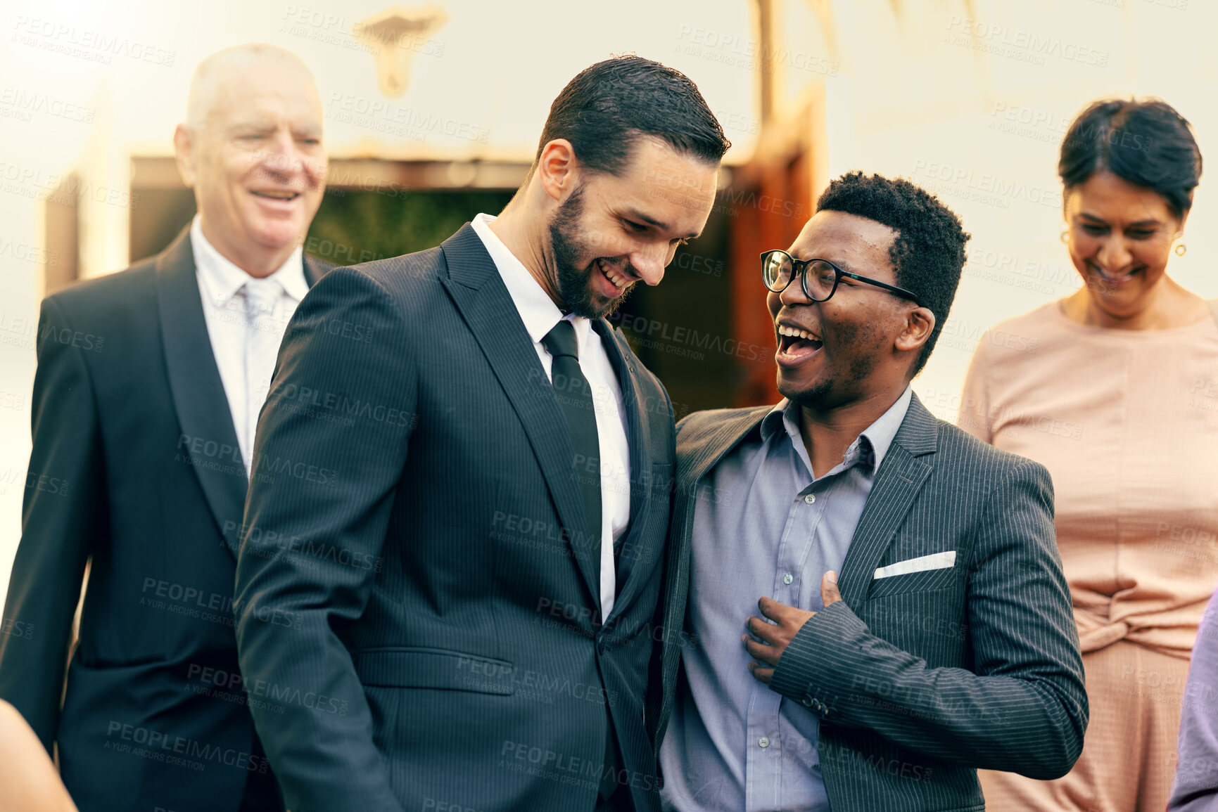 Buy stock photo Wedding, guests and friends laughing in celebration, bond and enjoying conversation, happy and joy. Diversity, people and marriage ceremony by cheerful group having fun, celebrating at formal event