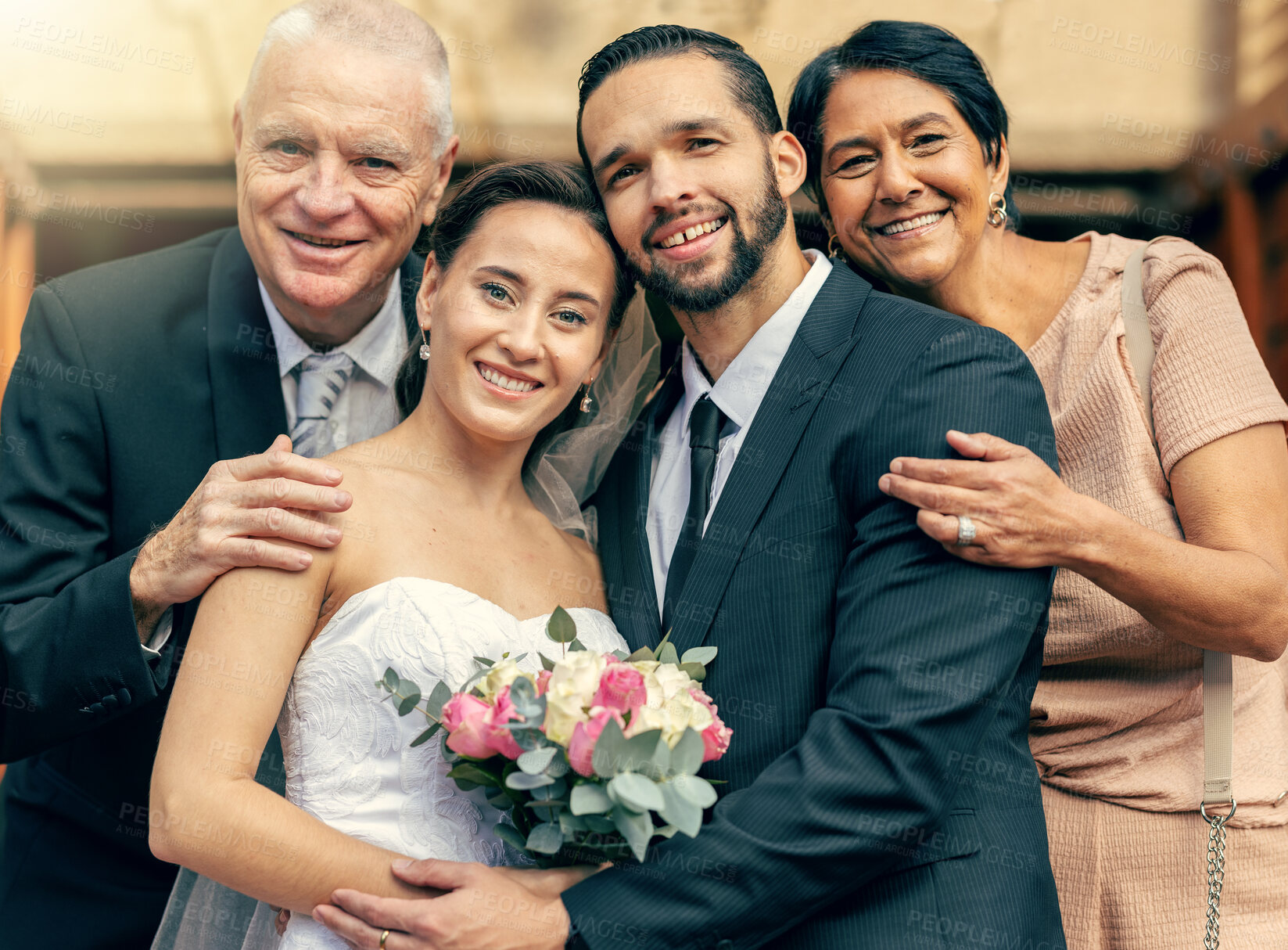 Buy stock photo Bride, groom and family portrait hug for wedding celebration, generations or marriage at the church. Married man and woman with happy family smile for commitment, trust or love and support together