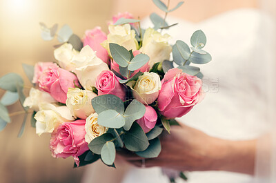 Wedding, flowers and rose bouquet of bride ready to walk isle for marriage, catholic religion ceremony and life commitment. Boutique floral arrangement, yellow and pink roses in womans hand to marry