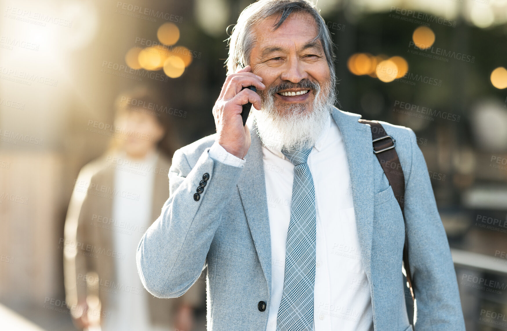 Buy stock photo Travel, phone call and businessman walking in city bokeh with smile for career opportunity, communication or negotiation success. Urban, Asian and senior boss or leader talking on a mobile smartphone